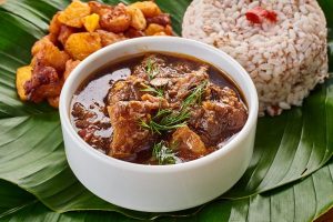 ofada rice with assorted ofada sauce and diced plantain 600x400